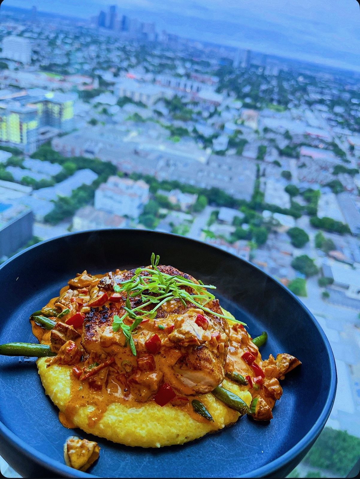 Blackened red snapper with polenta & cajun crawfish sauce